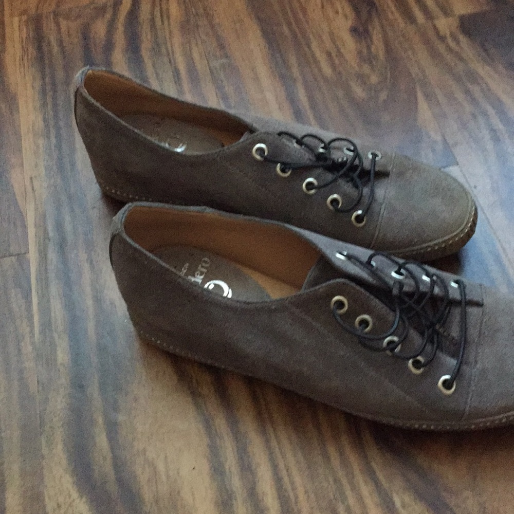 Grey suede flats.